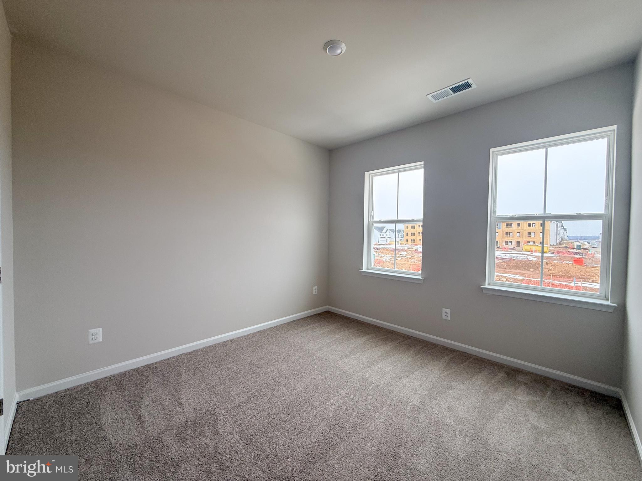 430 Silver Birch Drive Ranson, WV 25438 - Photo 8 of 11 an empty room with windows