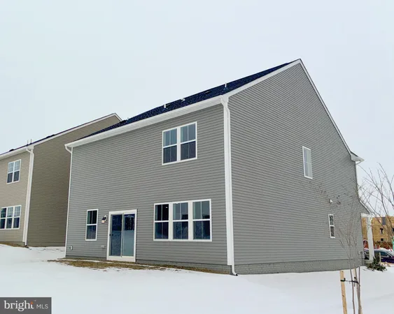 a front view of a house with garage