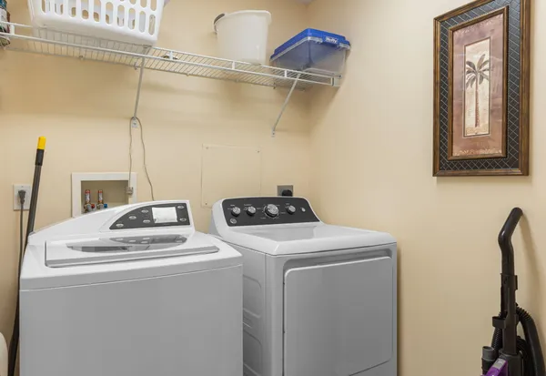 a utility room with dryer and washer