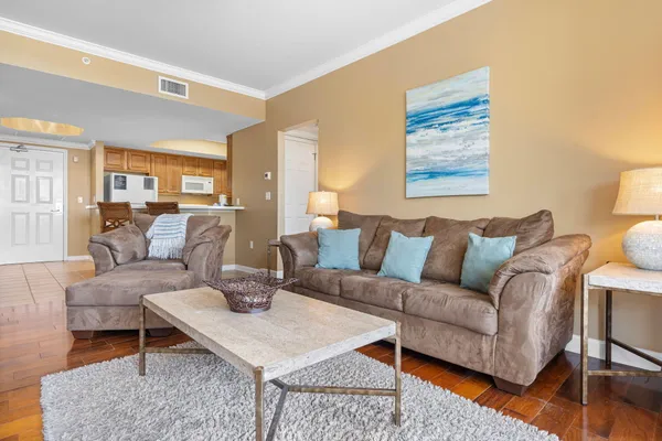 a living room with furniture and a table