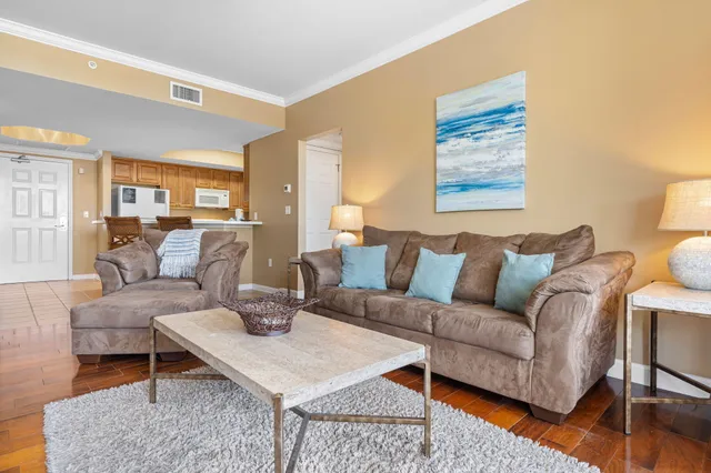 a living room with furniture and a table