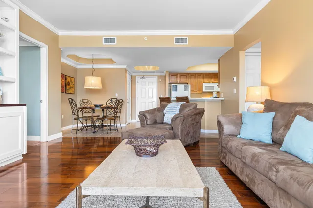 a living room with furniture and a table