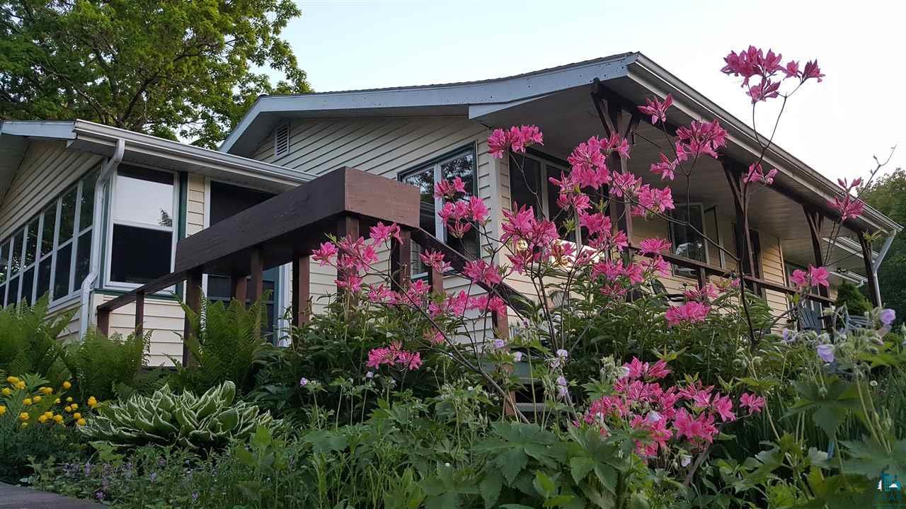 2906 Olson Road Cloquet, MN 55720 - Photo 14 of 17 Perennials in front of home
