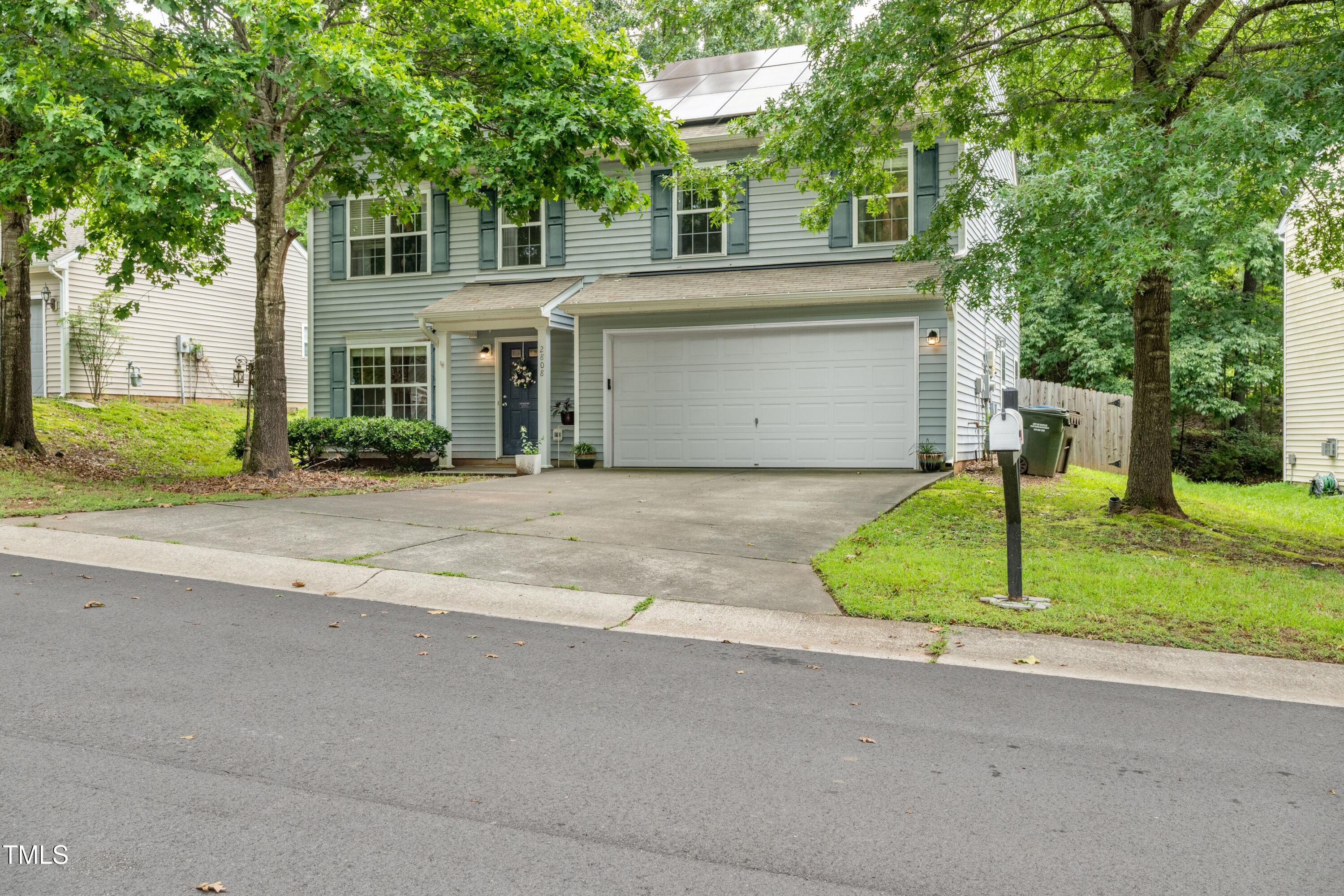 2808 Maple Ridge Drive Durham, NC 27704 - Photo 3 of 22 a view of a house with a yard