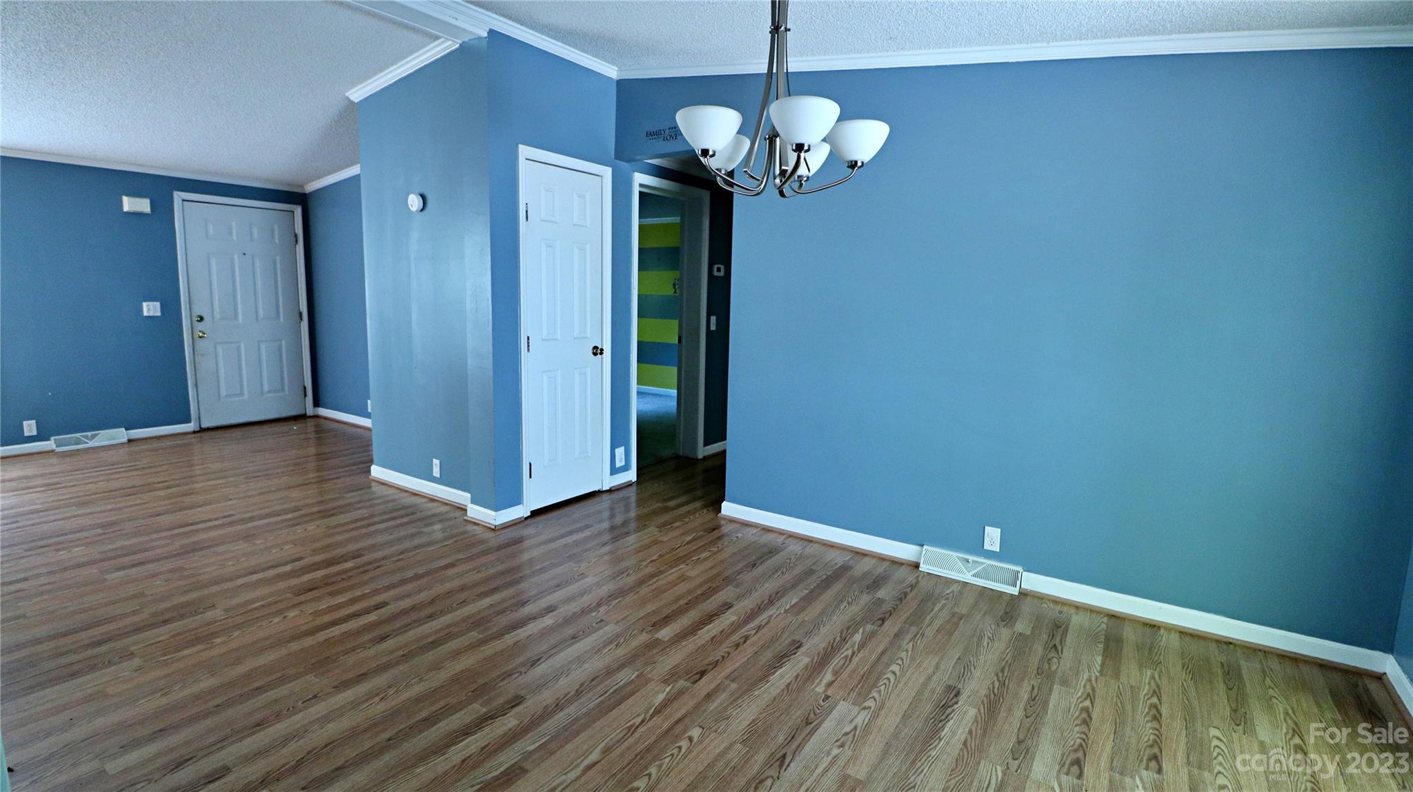 61 Sloan Street Old Fort, NC 28762 - Photo 12 of 38 a view of livingroom with wooden floor