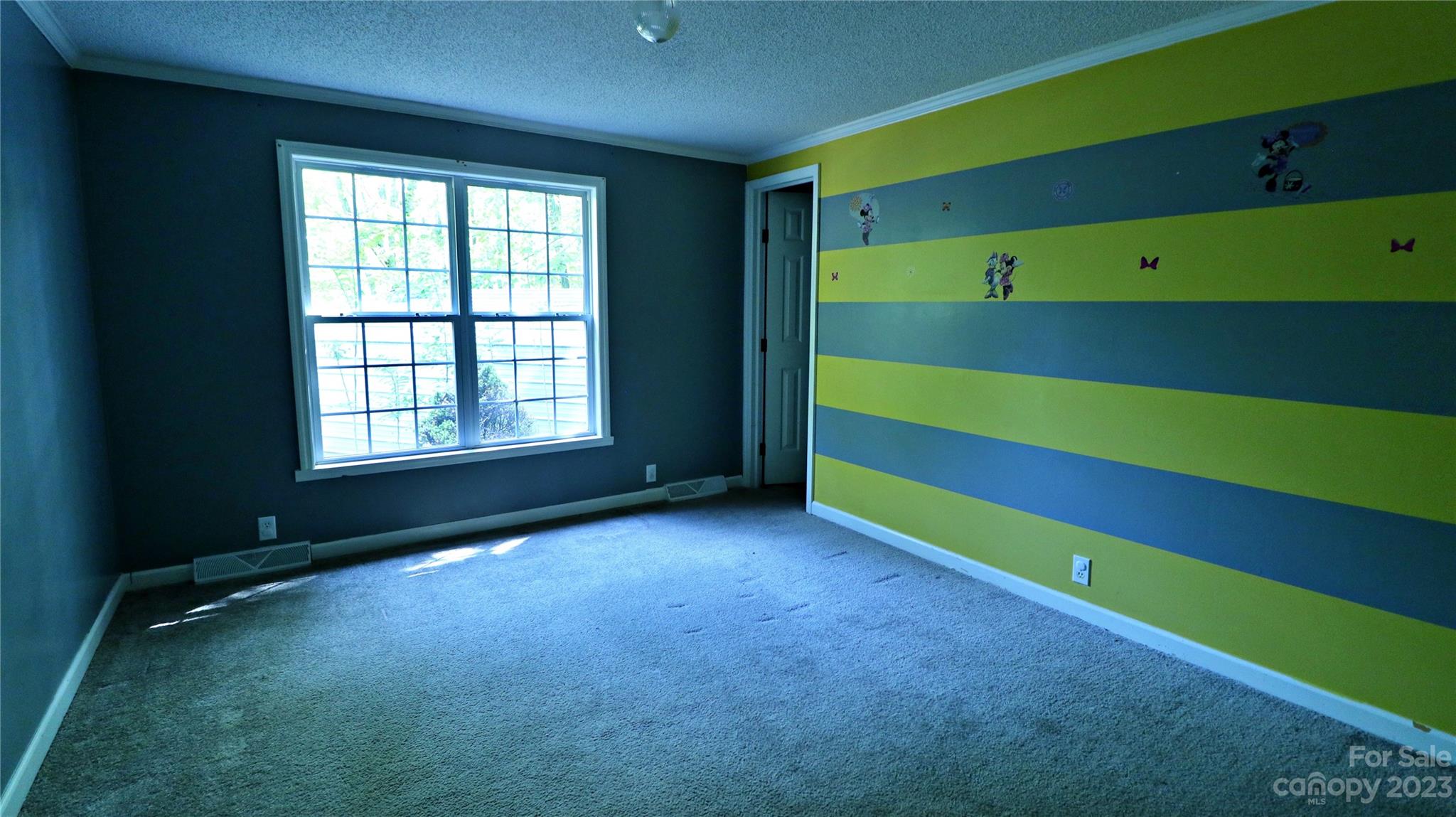 61 Sloan Street Old Fort, NC 28762 - Photo 14 of 38 a view of an empty room with a window