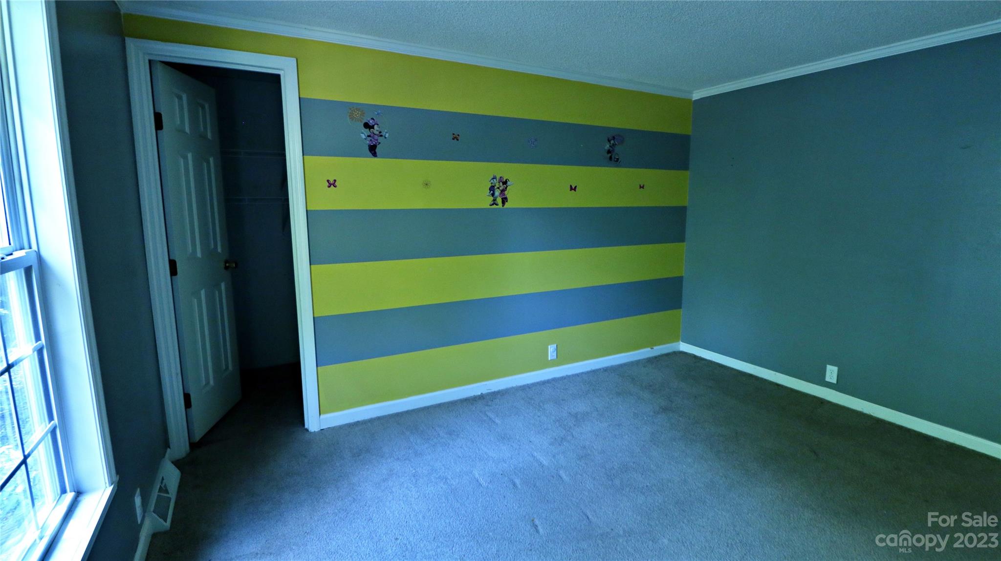 61 Sloan Street Old Fort, NC 28762 - Photo 15 of 38 a view of room with window and stairs