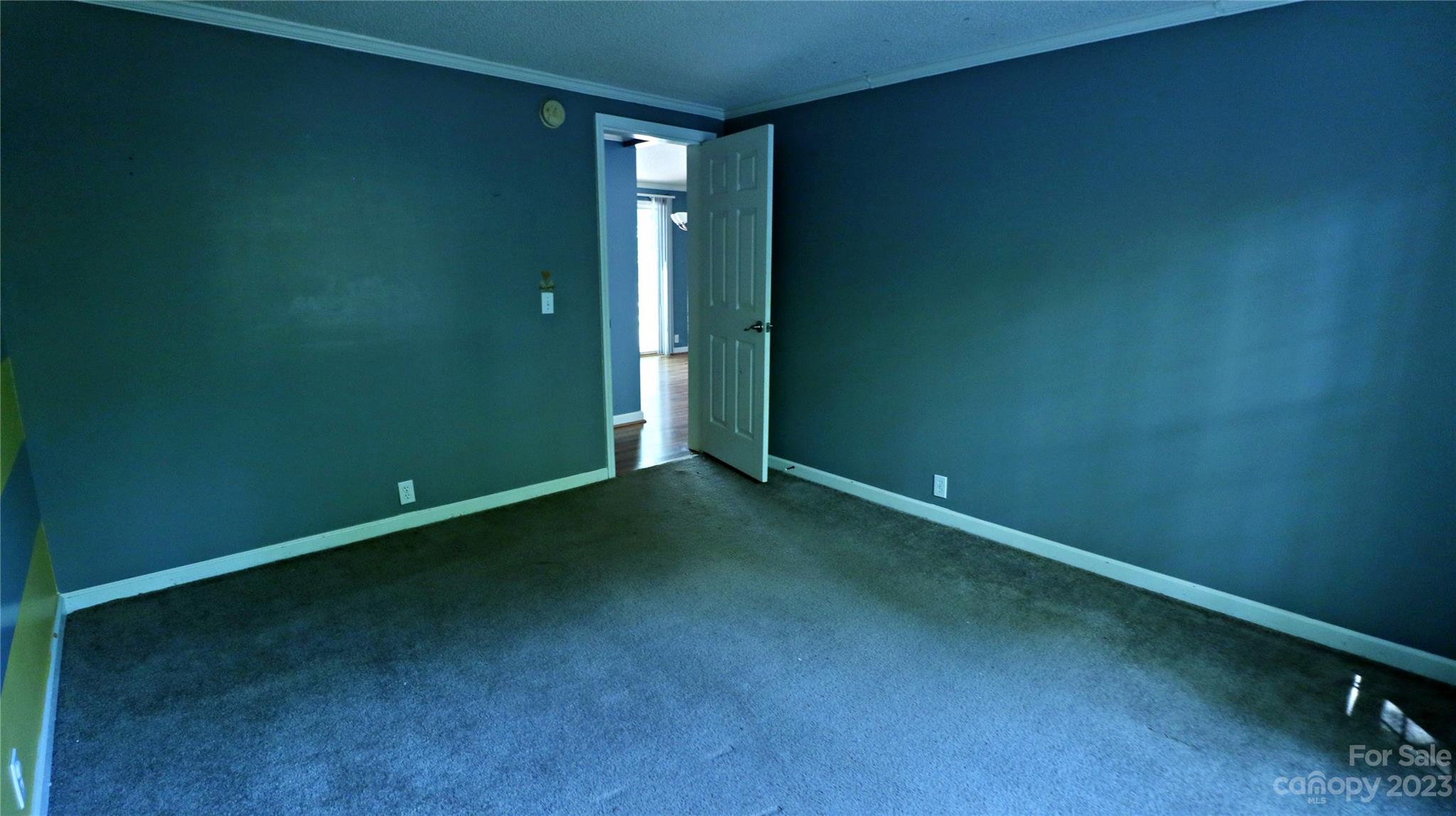 61 Sloan Street Old Fort, NC 28762 - Photo 18 of 38 an empty room with an empty space and window