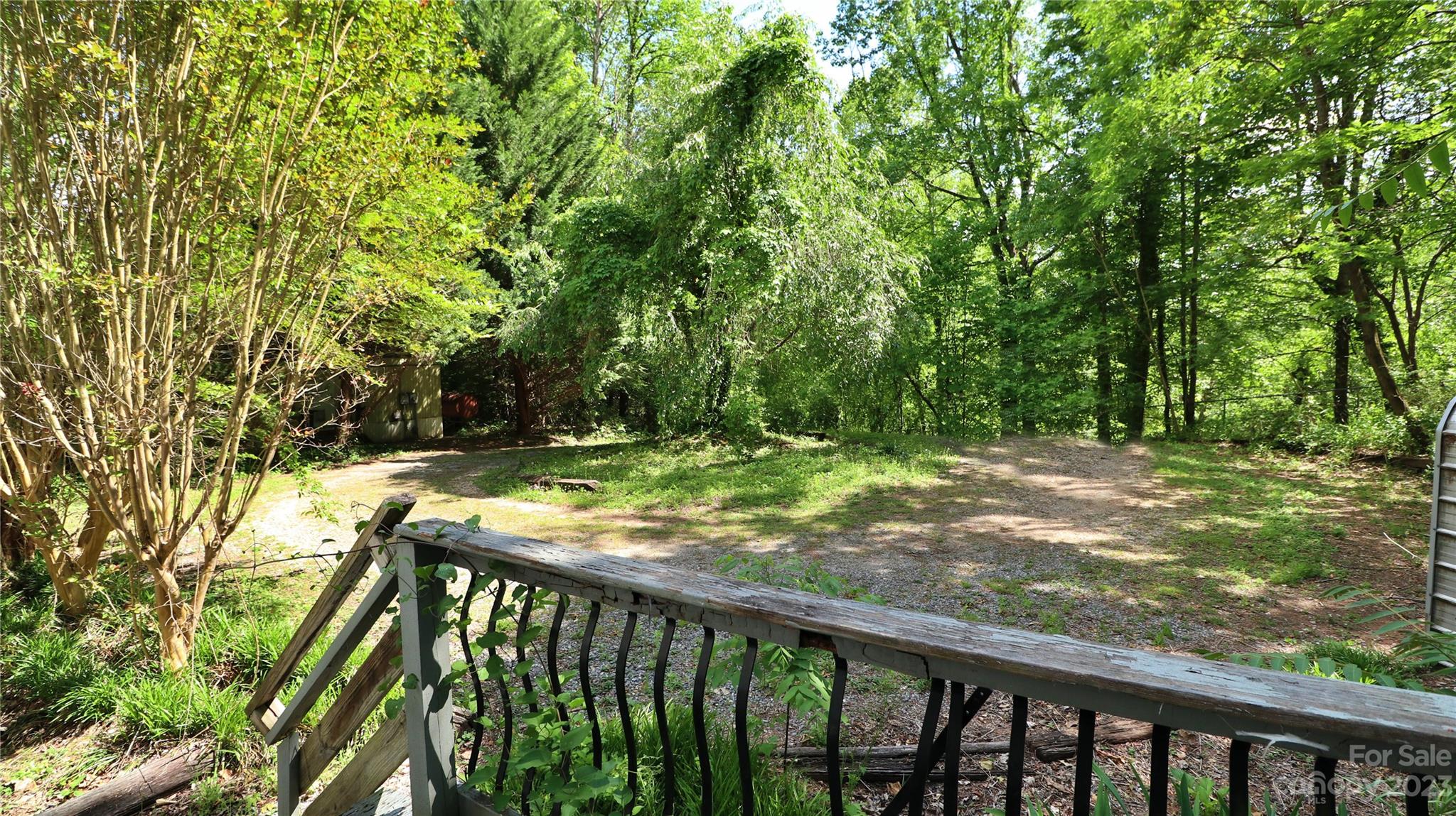 61 Sloan Street Old Fort, NC 28762 - Photo 36 of 38 a view of backyard with green space