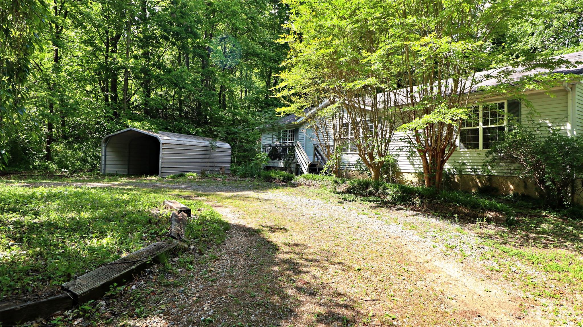 61 Sloan Street Old Fort, NC 28762 - Photo 38 of 38 a view of a house with a yard