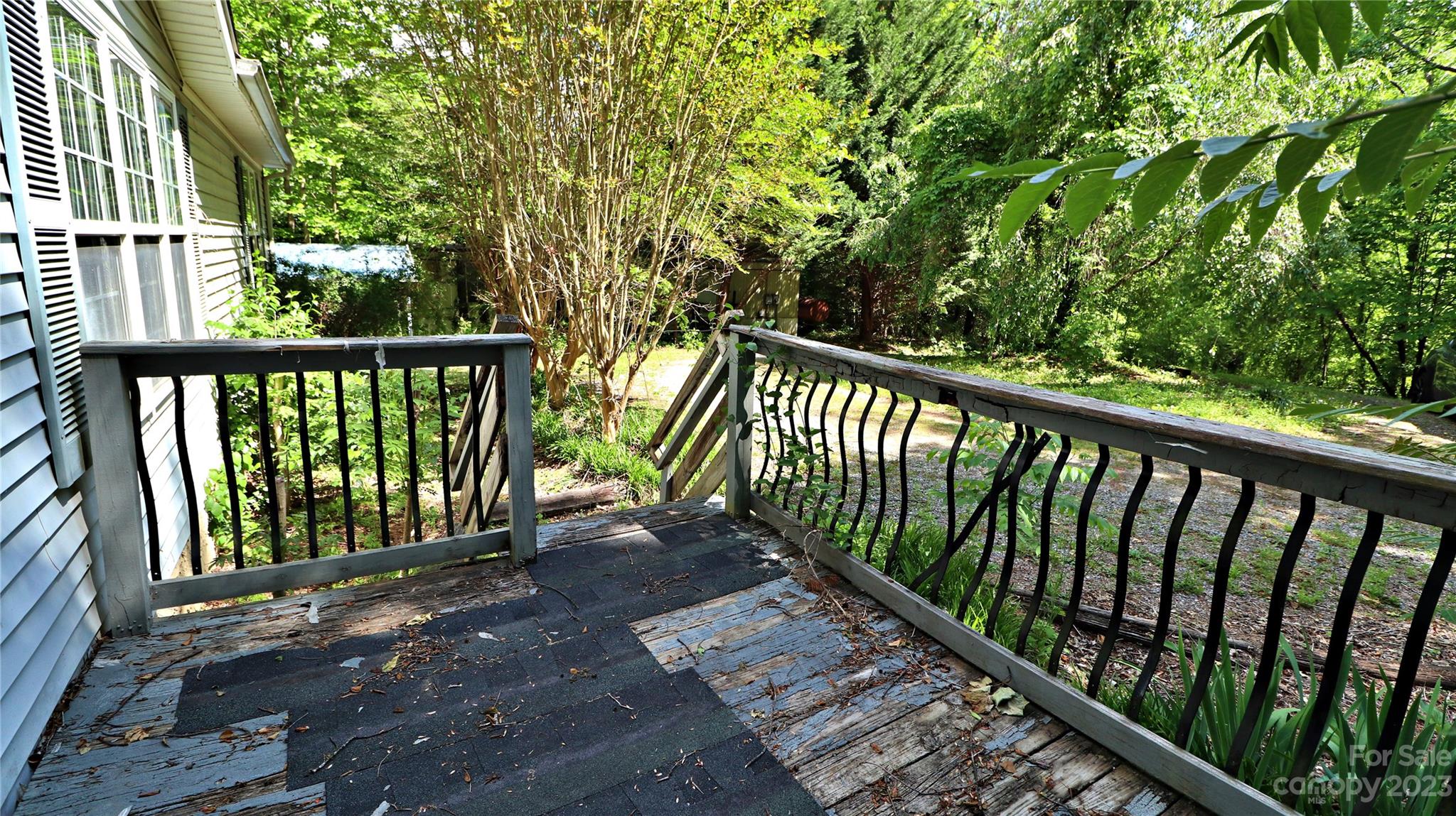 61 Sloan Street Old Fort, NC 28762 - Photo 7 of 38 a view of city from a balcony