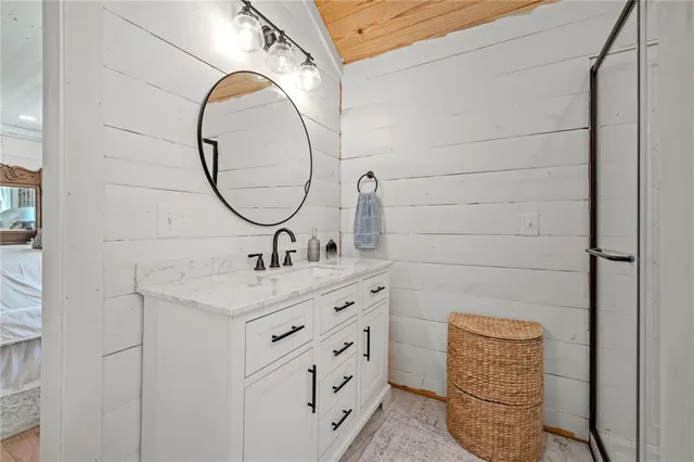 a bathroom with a sink and a mirror