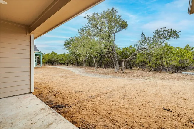 a view of a balcony with chairs