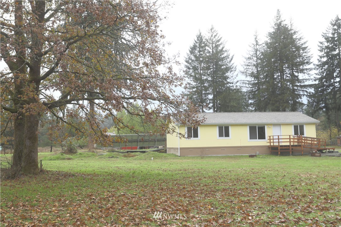 10046 168th Avenue Southwest Rochester, WA 98579 - Photo 3 of 33 a view of house with a yard