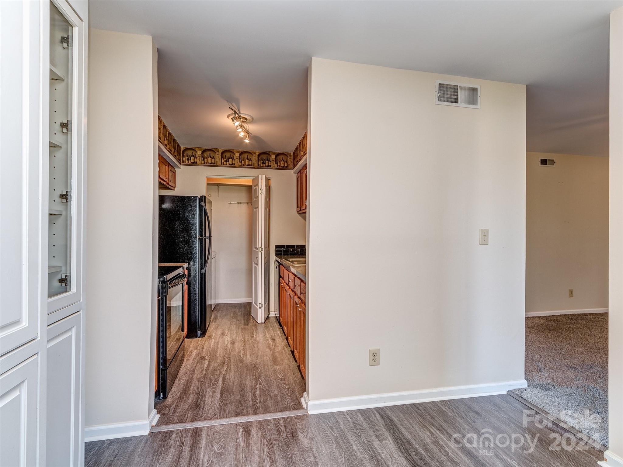 11014 Cedar View Road Charlotte, NC 28226 - Photo 16 of 32 a view of entryway with wooden floor
