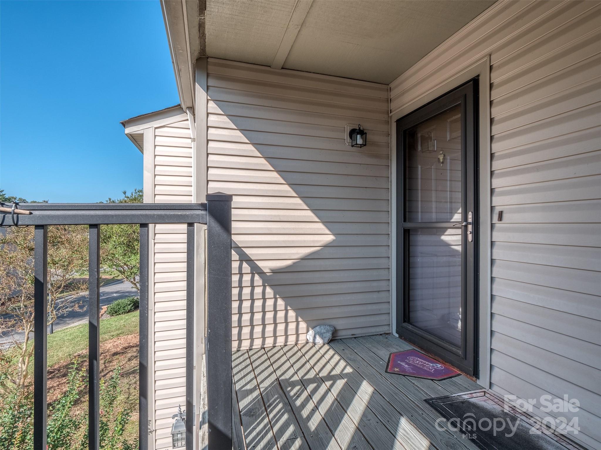 11014 Cedar View Road Charlotte, NC 28226 - Photo 2 of 32 a view of a house with a balcony