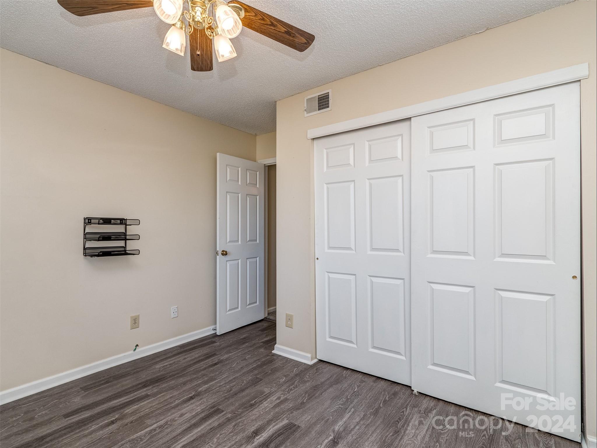 11014 Cedar View Road Charlotte, NC 28226 - Photo 24 of 32 a view of empty room with wooden floor