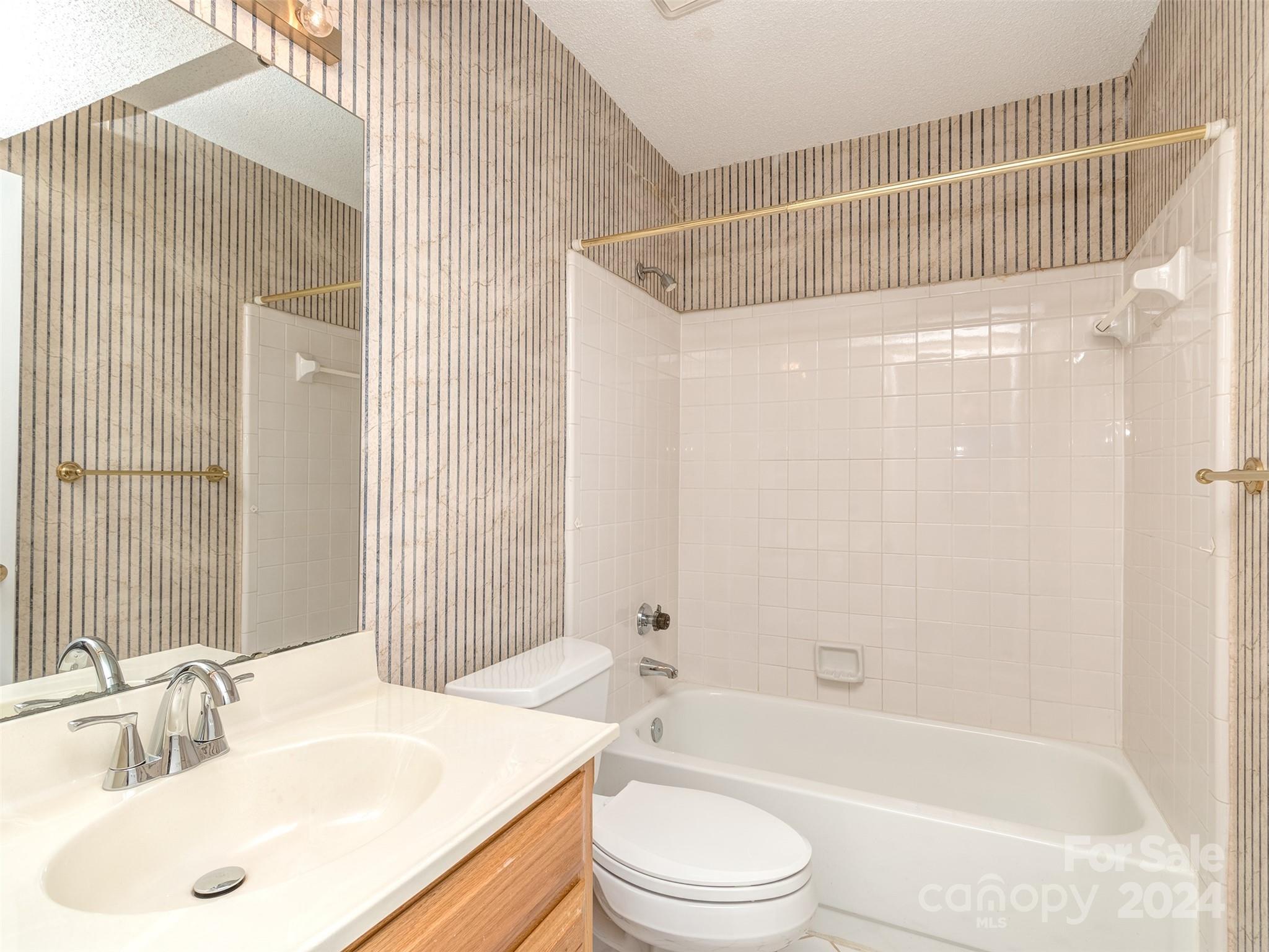 11014 Cedar View Road Charlotte, NC 28226 - Photo 26 of 32 a bathroom with a sink toilet and shower