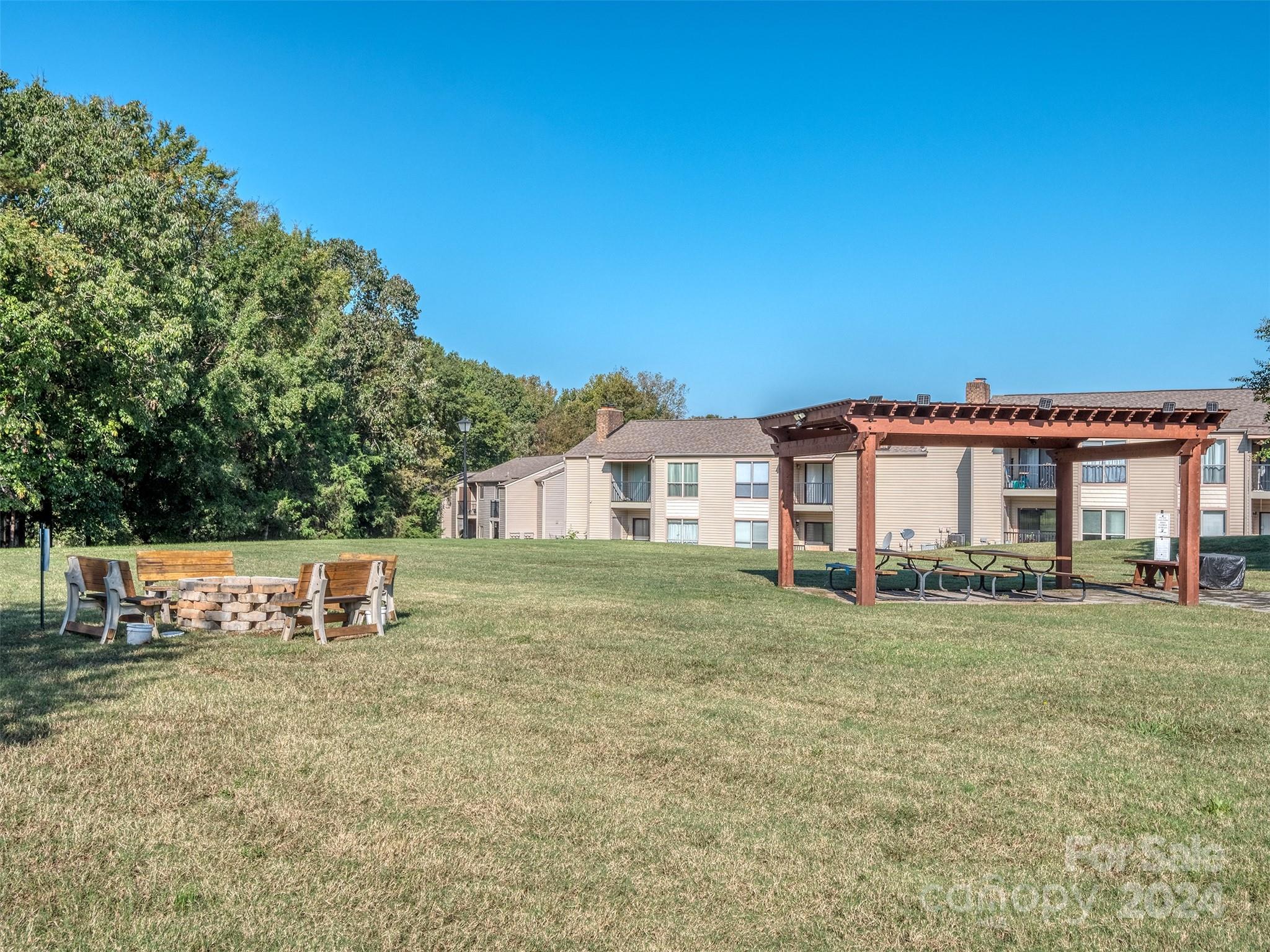 11014 Cedar View Road Charlotte, NC 28226 - Photo 27 of 32 a view of a house with a yard