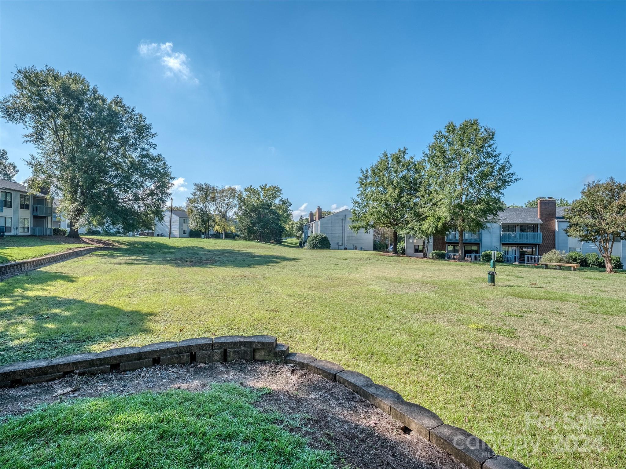 11014 Cedar View Road Charlotte, NC 28226 - Photo 28 of 32 a view of a yard with an outdoor space