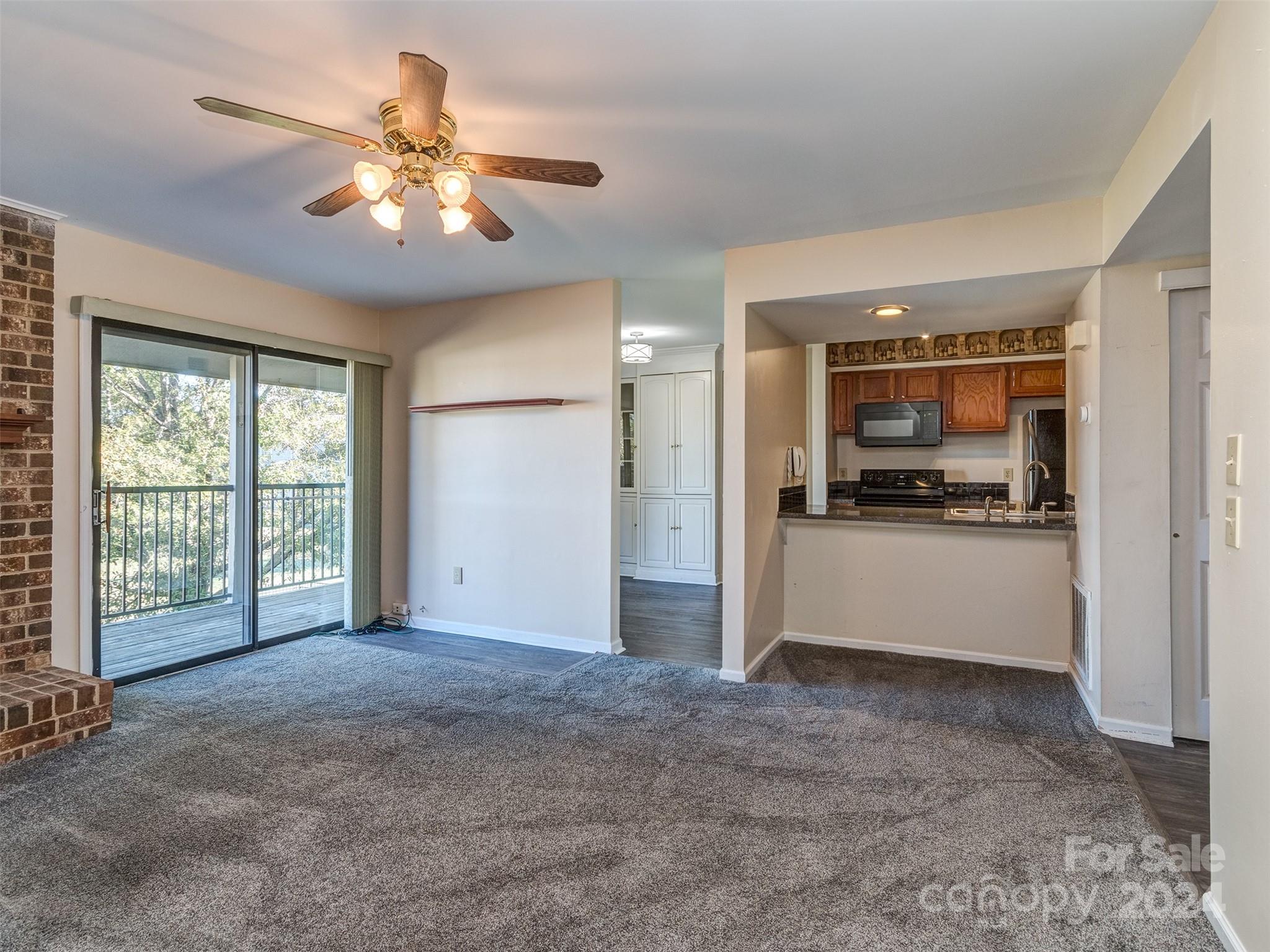 11014 Cedar View Road Charlotte, NC 28226 - Photo 4 of 32 a view of an empty room with a window