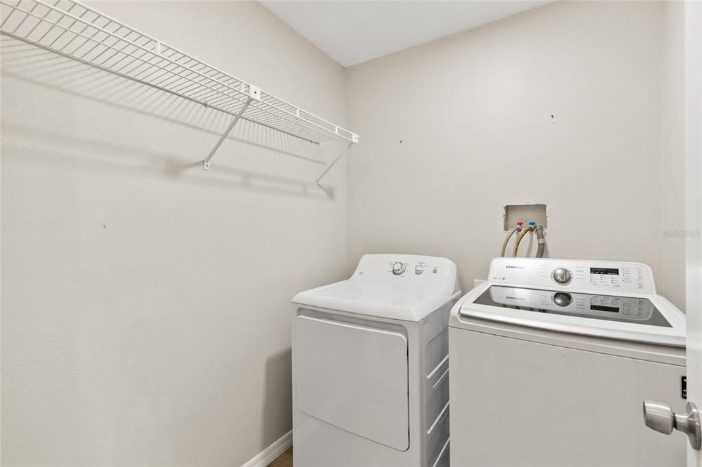 1009 Kings Court Venice, FL 34293 - Photo 12 of 25 a utility room with dryer and washer