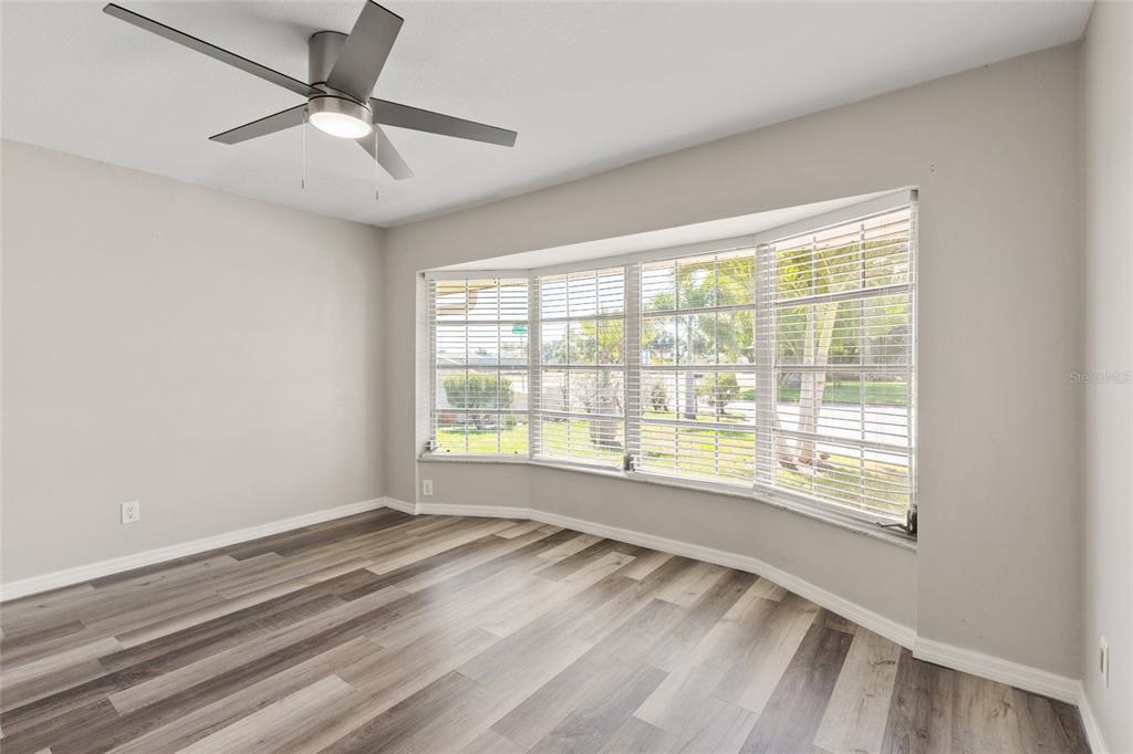 1009 Kings Court Venice, FL 34293 - Photo 13 of 25 a view of an empty room with a window