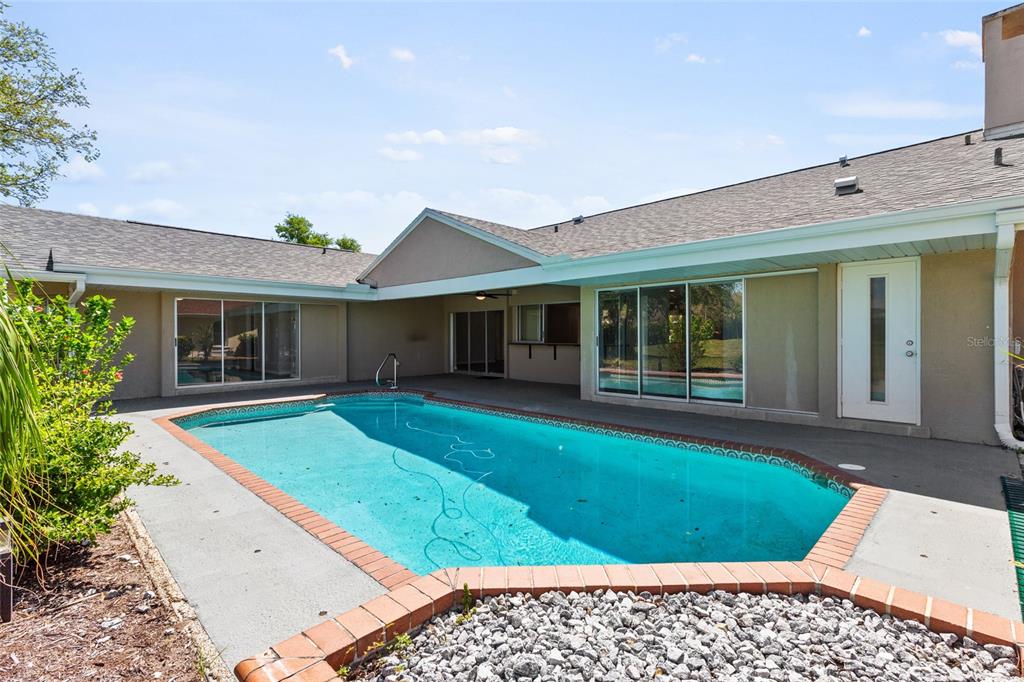 1009 Kings Court Venice, FL 34293 - Photo 19 of 25 a view of a house with a yard