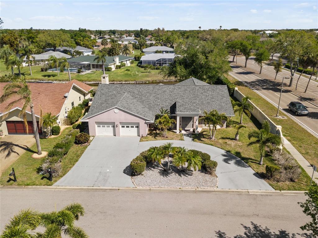 1009 Kings Court Venice, FL 34293 - Photo 21 of 25 an aerial view of a house with a garden