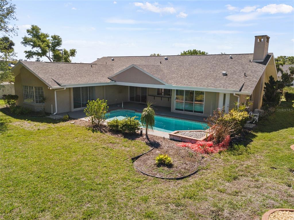1009 Kings Court Venice, FL 34293 - Photo 22 of 25 a front view of a house with garden