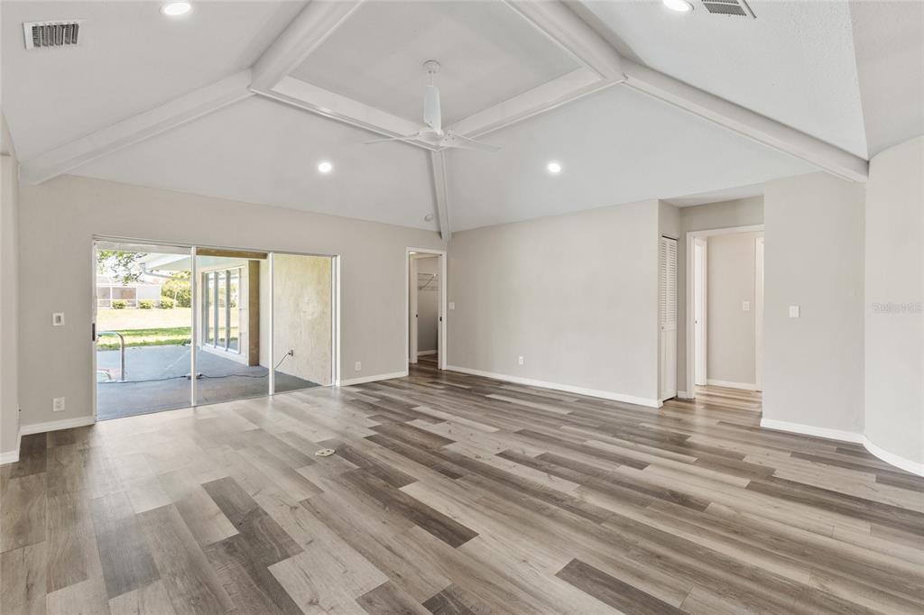 1009 Kings Court Venice, FL 34293 - Photo 7 of 25 a view of a livingroom with wooden floor