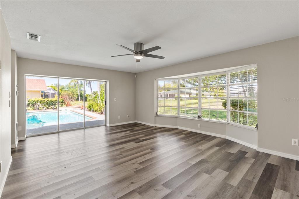 1009 Kings Court Venice, FL 34293 - Photo 9 of 25 a view of an empty room with a window