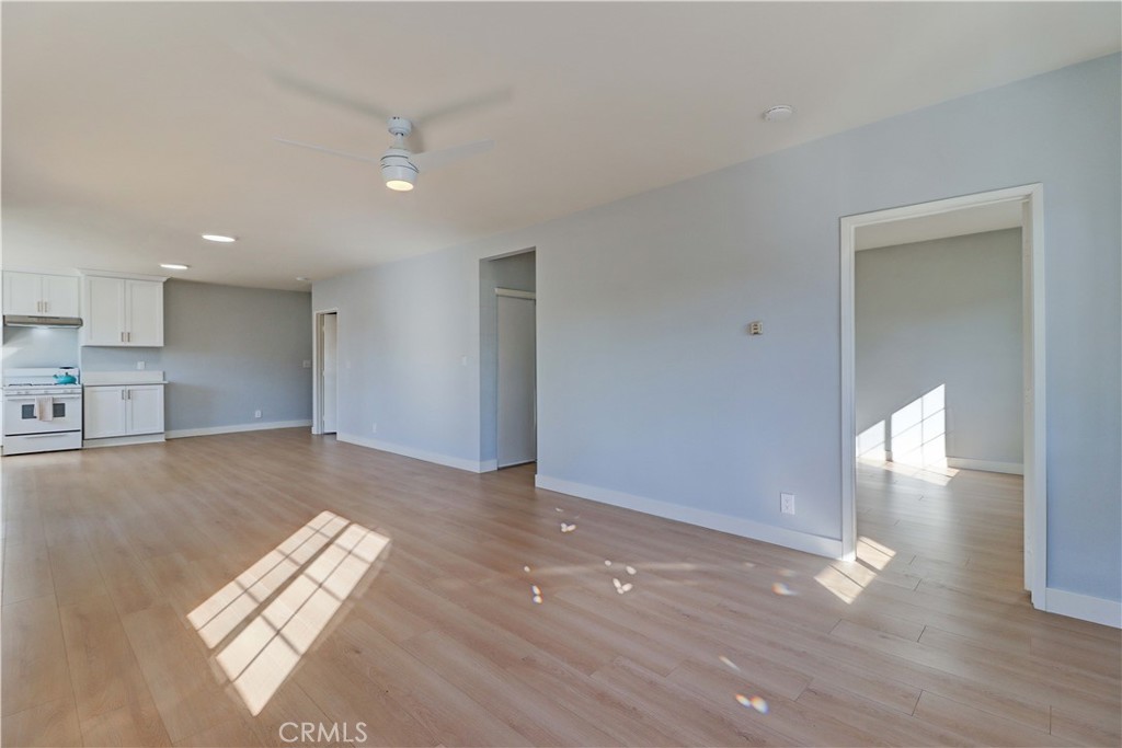 1101 Dawson Avenue Long Beach, CA 90804 - Photo 15 of 26 a view of empty room with wooden floor and window