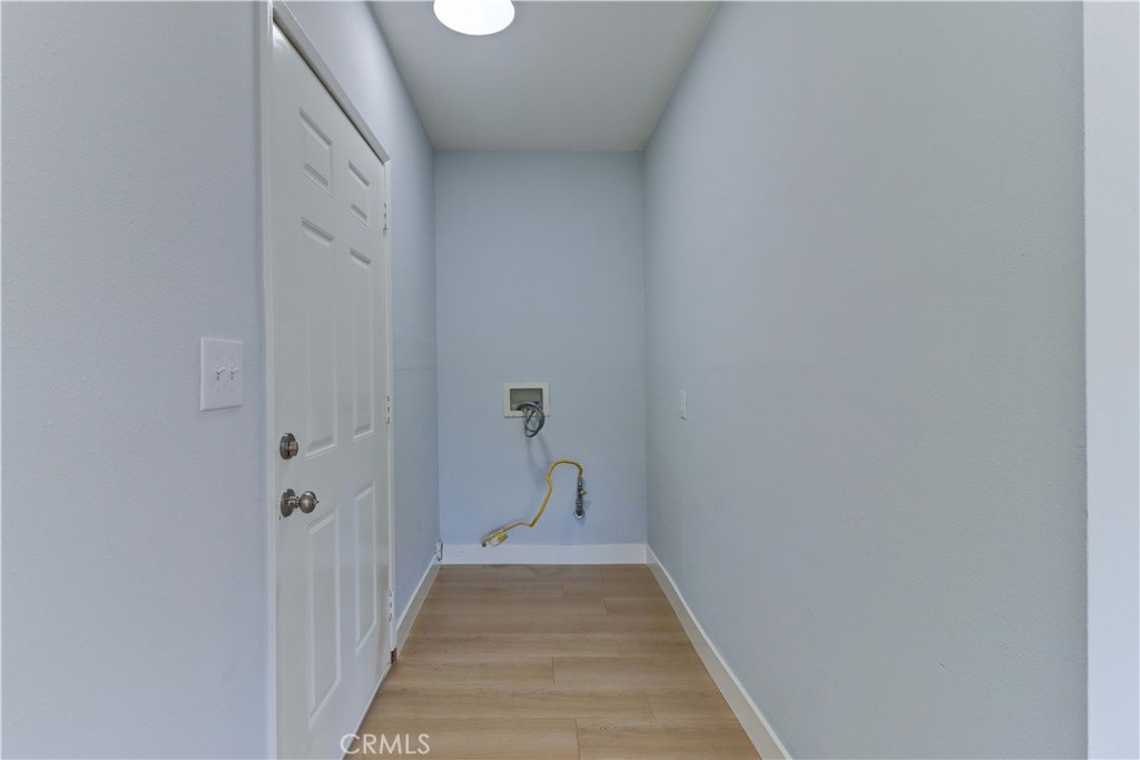 1101 Dawson Avenue Long Beach, CA 90804 - Photo 24 of 26 a view of a hallway with wooden floor and staircase