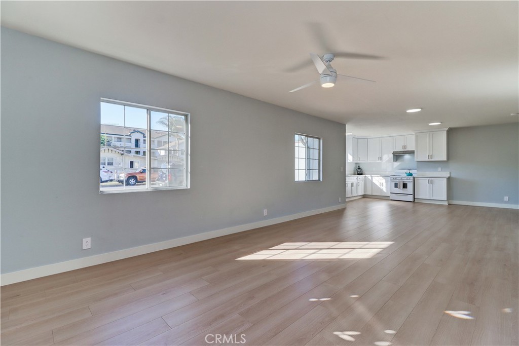 1101 Dawson Avenue Long Beach, CA 90804 - Photo 8 of 26 a view of kitchen and hall with wooden floor