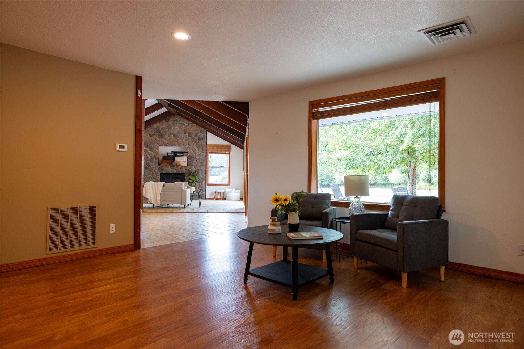 461 East Avery Road, Unit 35 Chehalis, WA 98532 - Photo 24 of 39 a living room with furniture and a large window