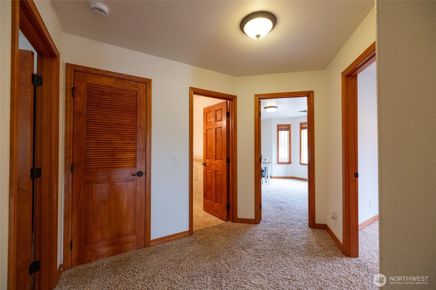 461 East Avery Road, Unit 35 Chehalis, WA 98532 - Photo 29 of 39 wooden floor and windows in a room