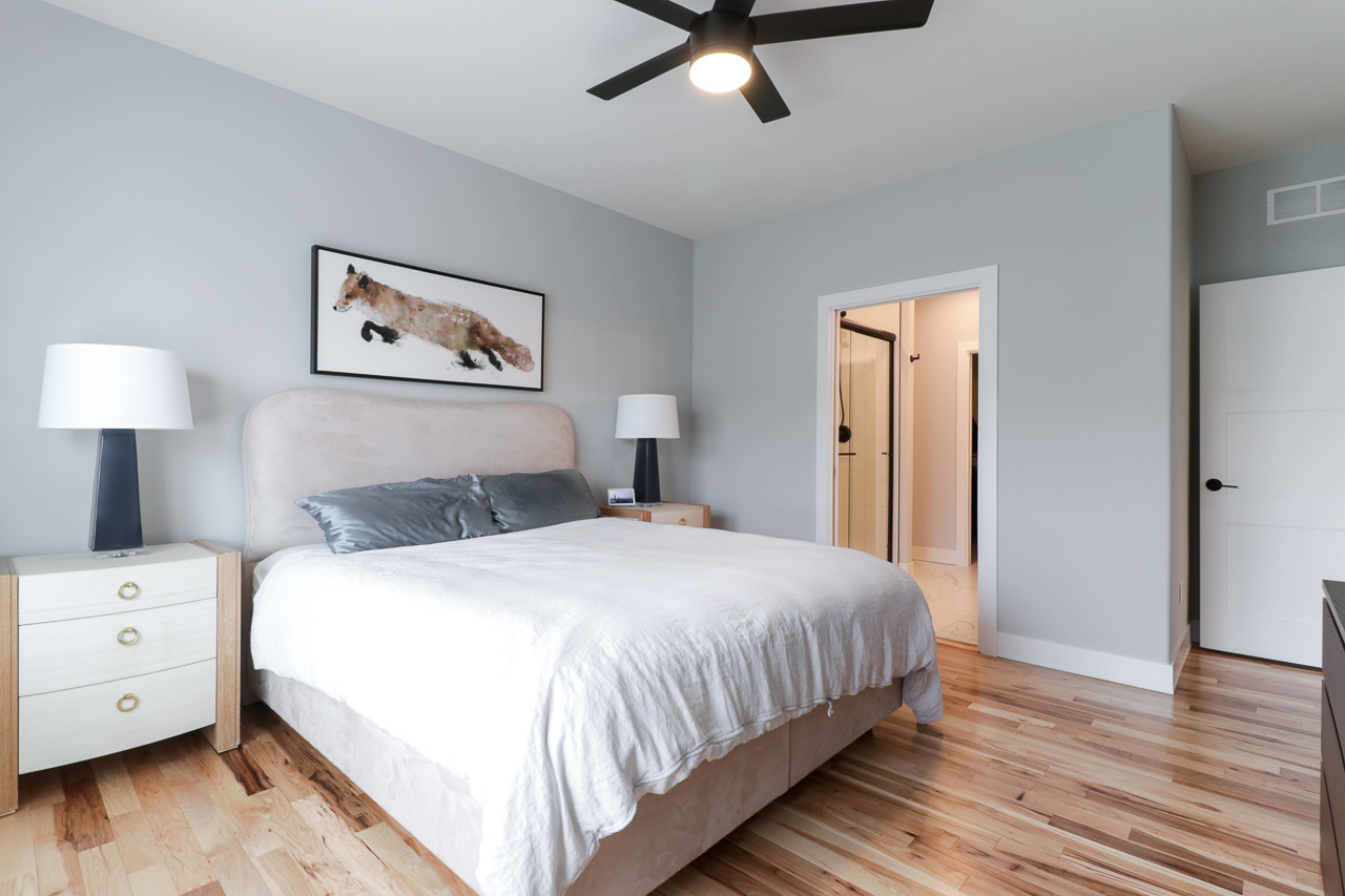 1708 Flagstone Drive Normal, IL 61761 - Photo 13 of 34 a bedroom with a bed and wooden floor