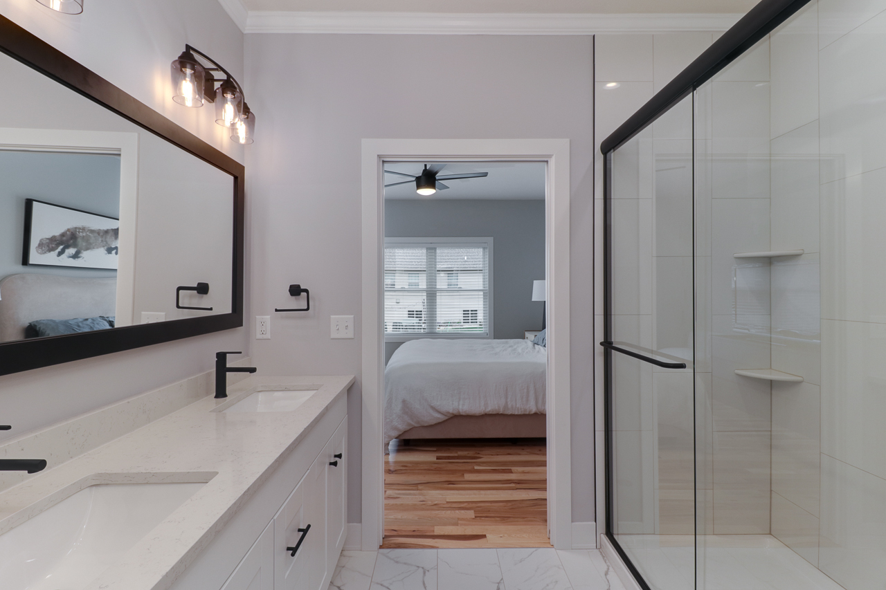 1708 Flagstone Drive Normal, IL 61761 - Photo 17 of 34 a bathroom with a sink and a mirror