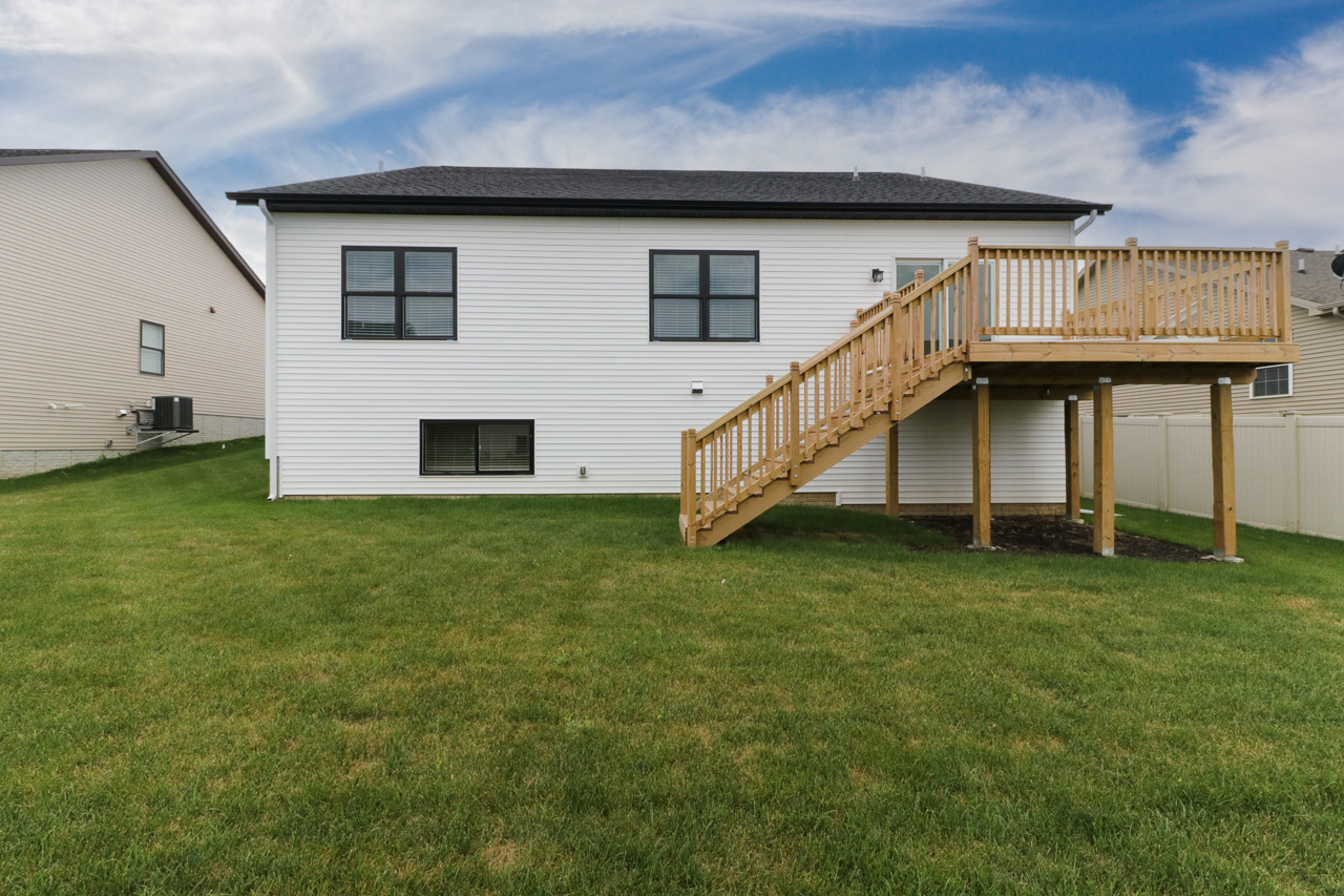 1708 Flagstone Drive Normal, IL 61761 - Photo 32 of 34 a house view with a garden space