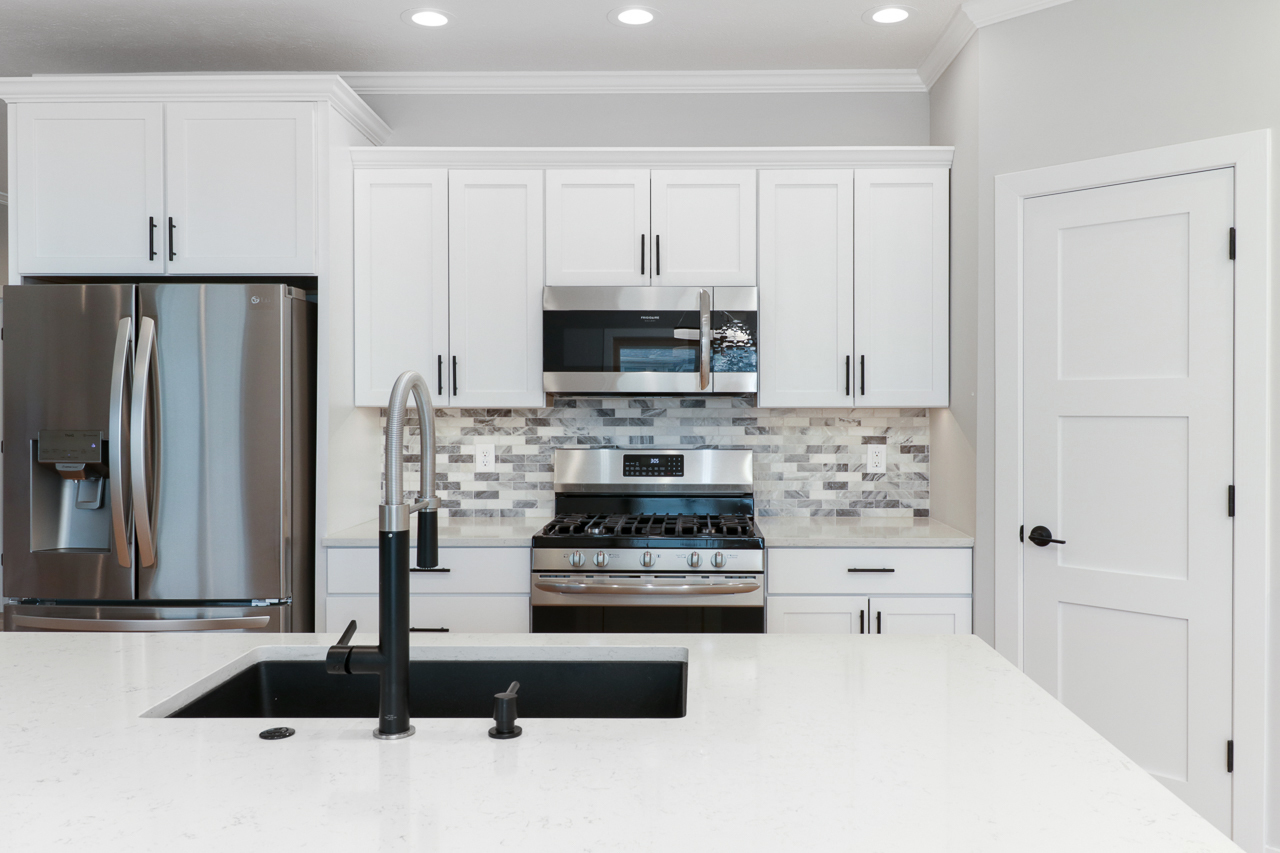 1708 Flagstone Drive Normal, IL 61761 - Photo 5 of 34 a kitchen with cabinets and appliances