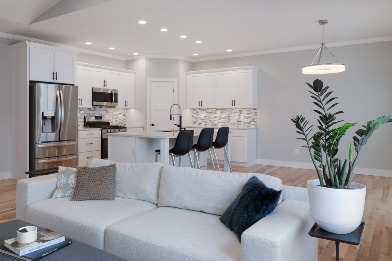 1708 Flagstone Drive Normal, IL 61761 - Photo 8 of 34 a living room with furniture and a chandelier