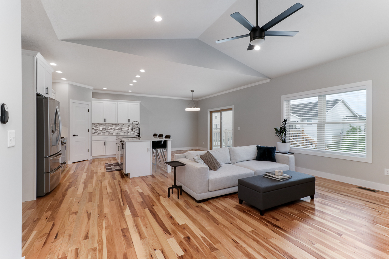 1708 Flagstone Drive Normal, IL 61761 - Photo 9 of 34 a living room with furniture and a wooden floor