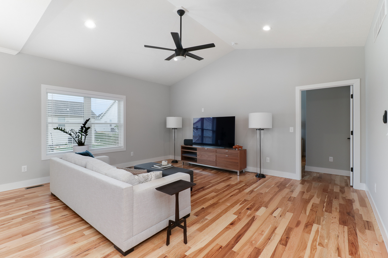 1708 Flagstone Drive Normal, IL 61761 - Photo 10 of 34 a living room with furniture and a wooden floor