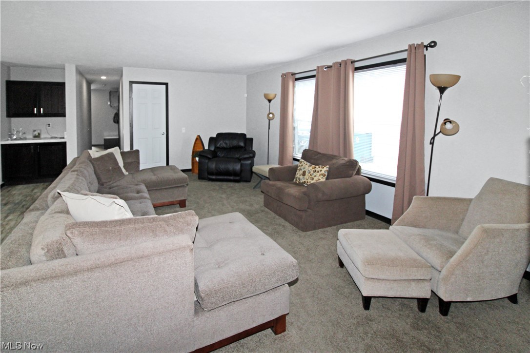 1609 Coldwater Crossing Road Lakeside Marblehead, OH 43440 - Photo 14 of 38 Living room featuring light carpet