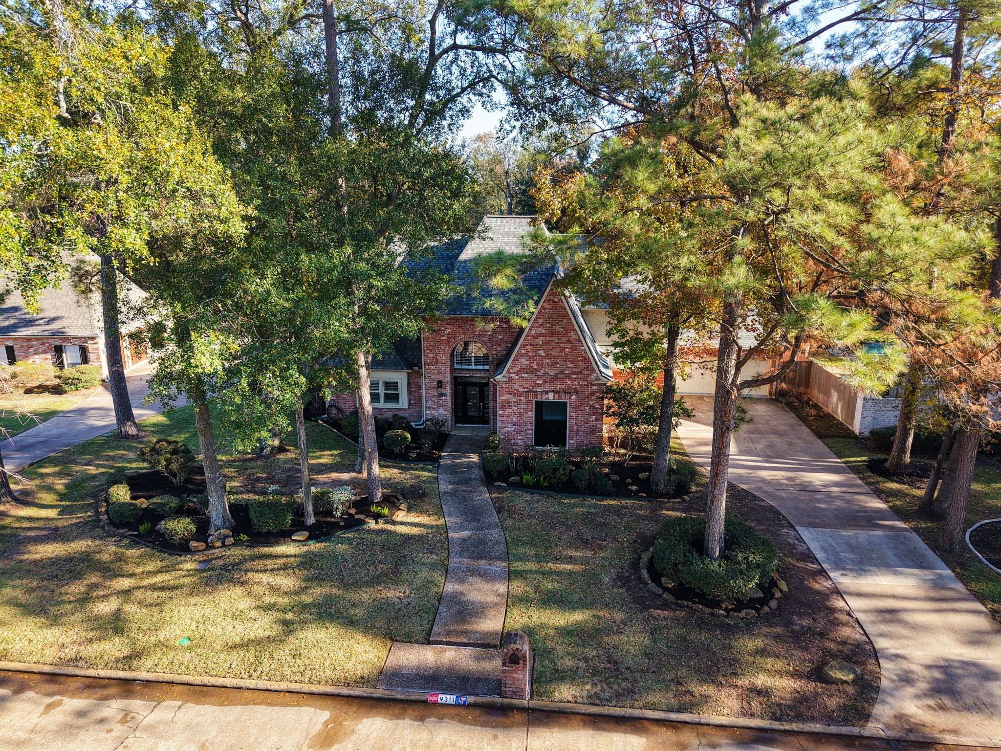 9311 Windrush Drive Spring, TX 77379 - Photo 43 of 50 Wooded yard is so welcoming!