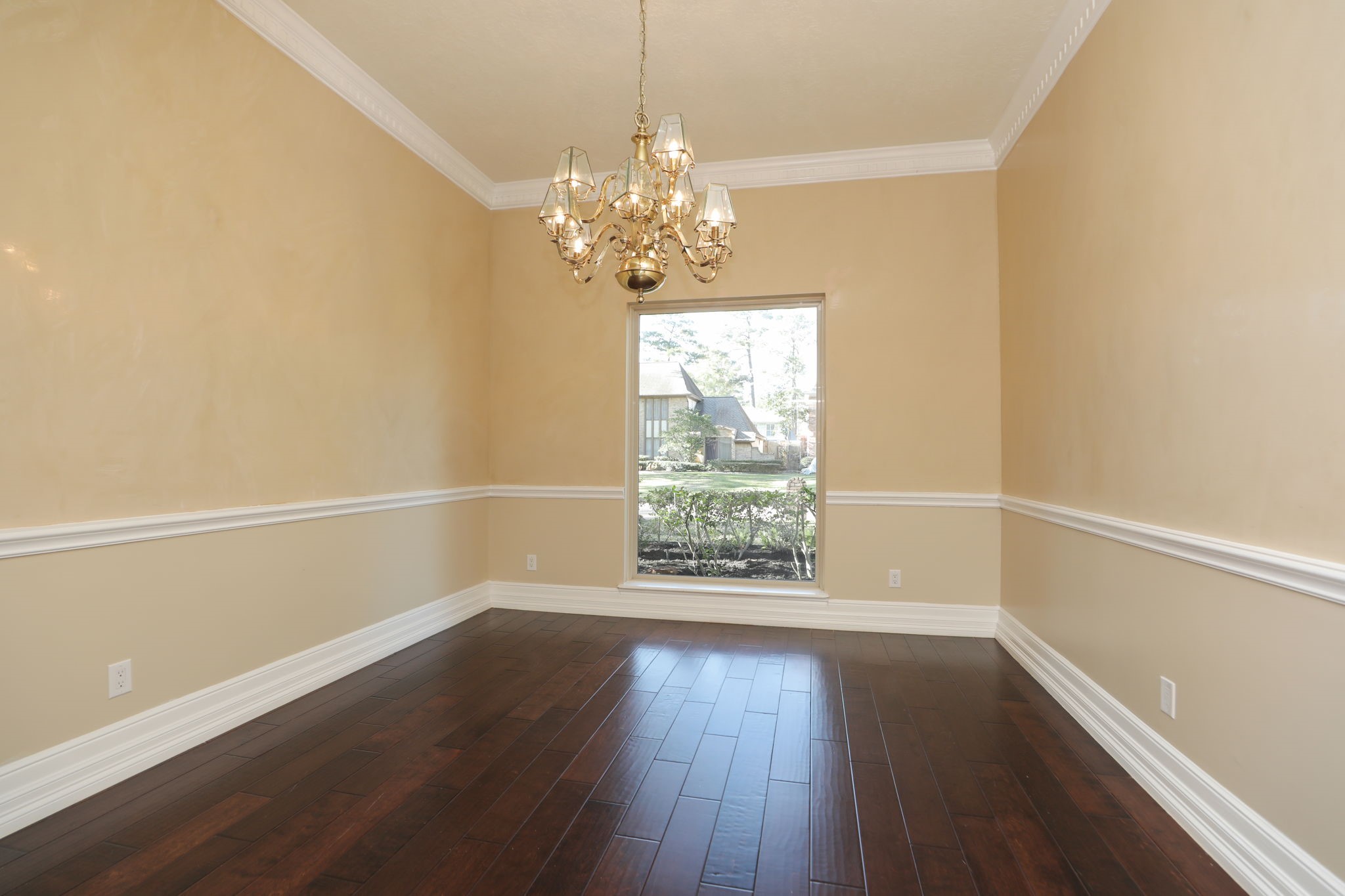 9311 Windrush Drive Spring, TX 77379 - Photo 9 of 50 Enjoy entertaining in this gorgeous front dining room with double molding, wood floors and front window. Welcome to the heart of the home.