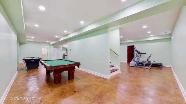 a room with furniture and stairs