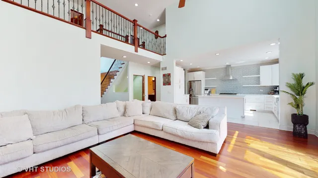 a living room with furniture and a rug