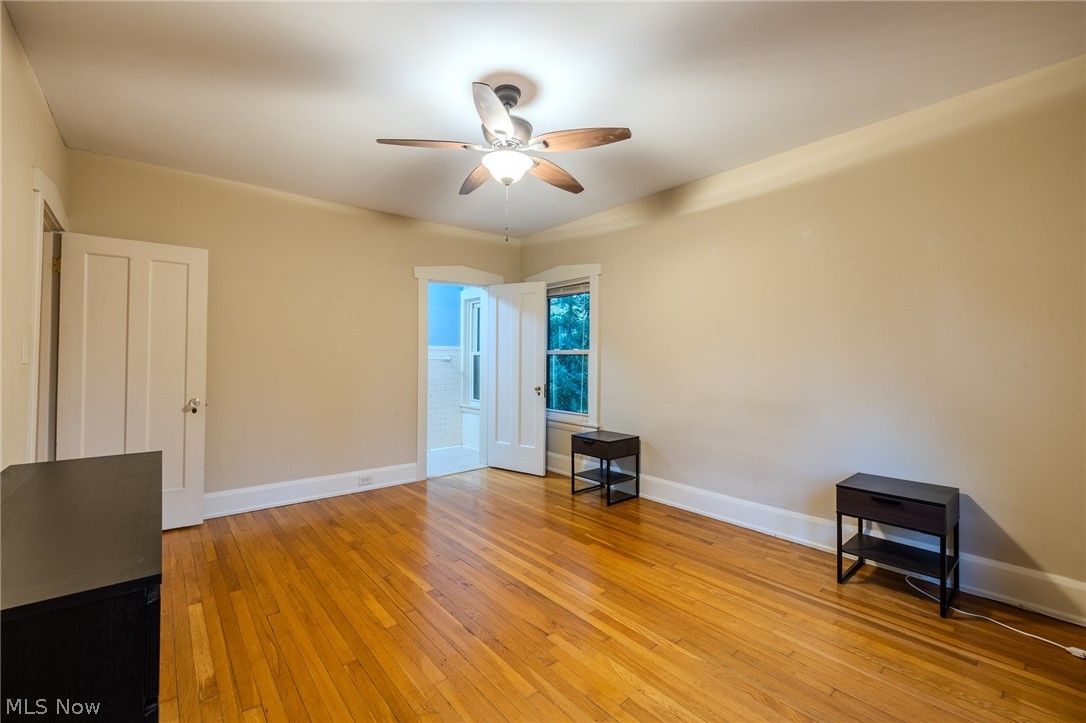 2472 Overlook Road Cleveland Heights, OH 44106 - Photo 21 of 30 Unfurnished room with light wood- flooring and ceiling fan